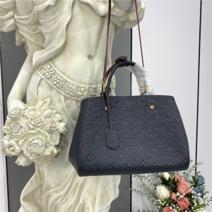 Montaigne MM Monogram Empreinte Leather Marine rouge
