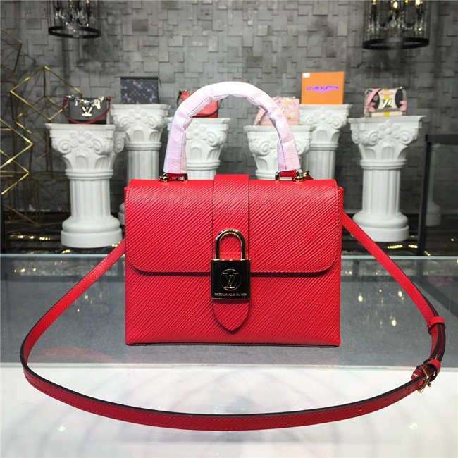 oversized gold-metal LV padlock closure