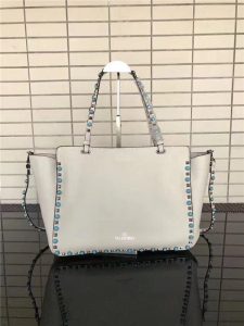 Valentino Rockstud Rolling White with turquoise stone