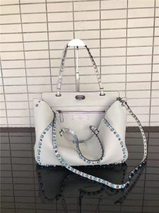 Valentino Rockstud Rolling White with turquoise stone