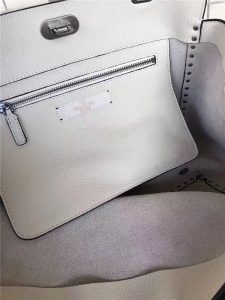 Valentino Rockstud Rolling White with turquoise stone
