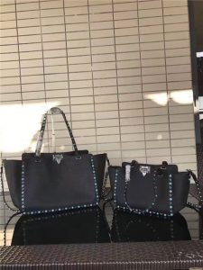 Valentino Rockstud Rolling Black with turquoise stone