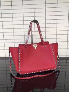 Valentino Rockstud Rolling Red with turquoise stone