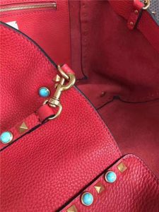 Valentino Rockstud Rolling Red with turquoise stone