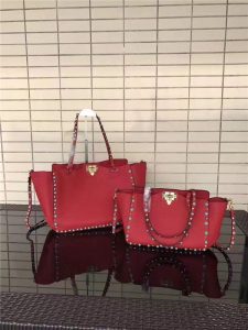 Valentino Rockstud Rolling Red with turquoise stone