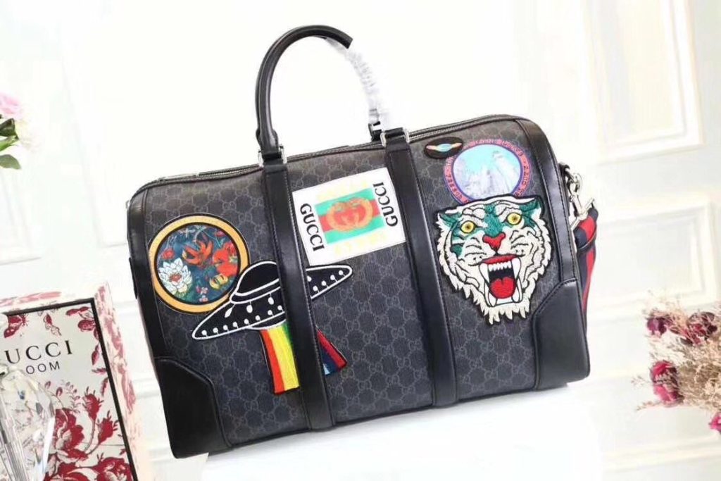 Gucci Night Courrier Soft GG Supreme Carry-on Duffle