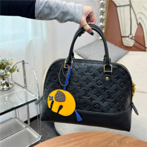 LV Elephant Bag Charm M02325 Orange-8.jpg