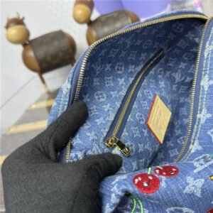 LV x TM Cosmetic Pouch GM M13893-8.jpg