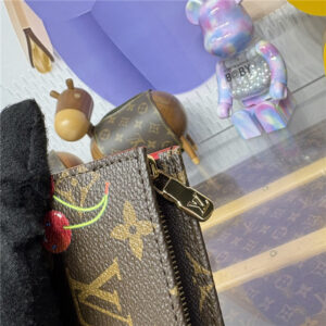 LV x TM Toiletry Pouch M14372-7.jpg
